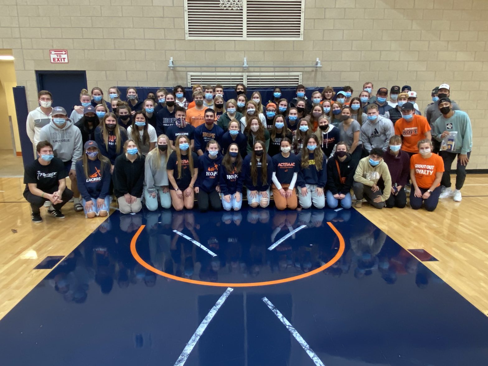 Hope student-athletes pose together for a group photo.