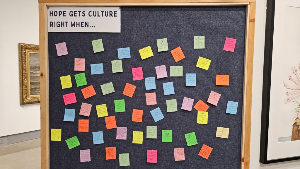 Bulletin board of post it notes saying "Hope Gets Culture Right When..."