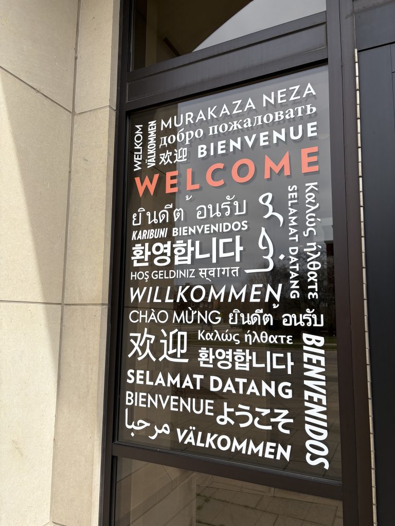 Window with the word "Welcome" written in many different languages