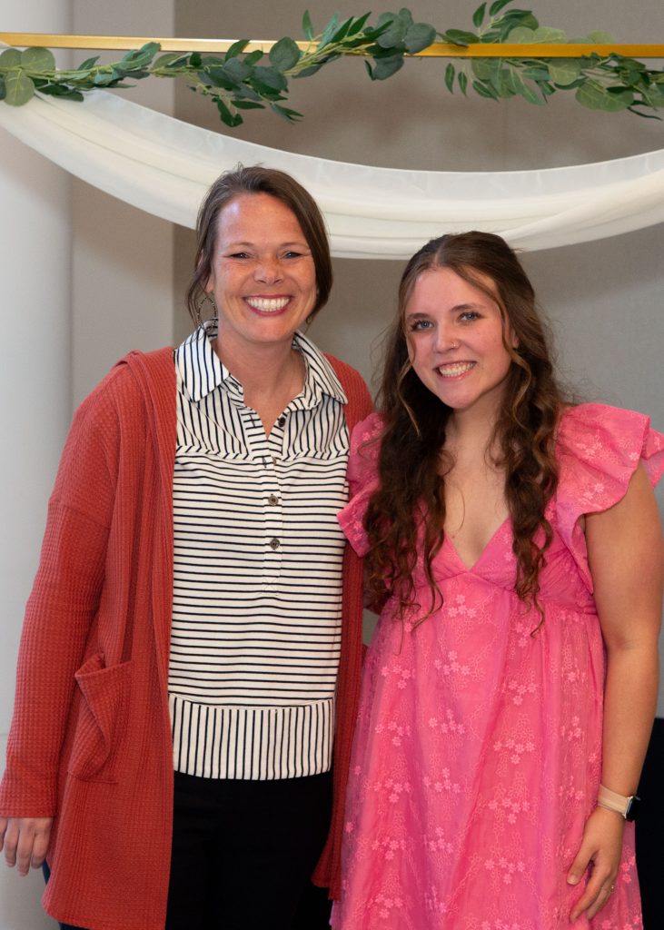 Photo of Madi (author) and her guest, Mary Vandehoef, at the Hope Forward Positive Impact Banquet.