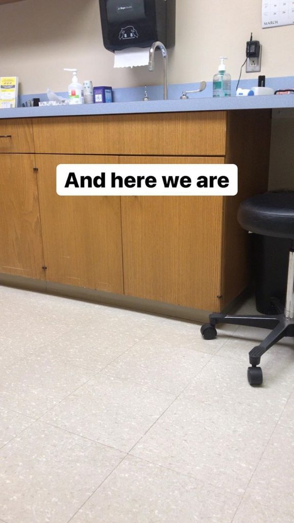 A photo of Safia's primary care physician's office. In black text with a white background, it reads "And here we are".
