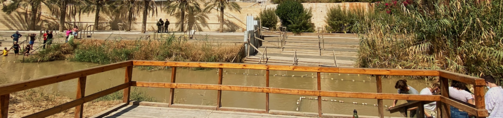 An image I will not soon forget. On the left, the Israeli side. On the right, my peers submerging themselves in the river from the Jordanian side. Israeli guards stand watch as the Jordanian guard behind me does the same.