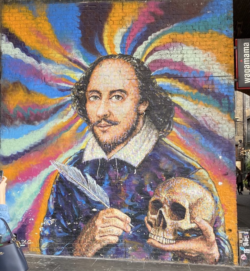 painting of Shakespeare below did not originally have the skull or quill.
