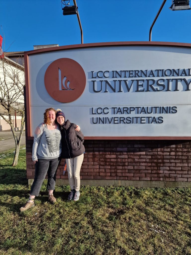 Me and my sister in front of the LCC University sign