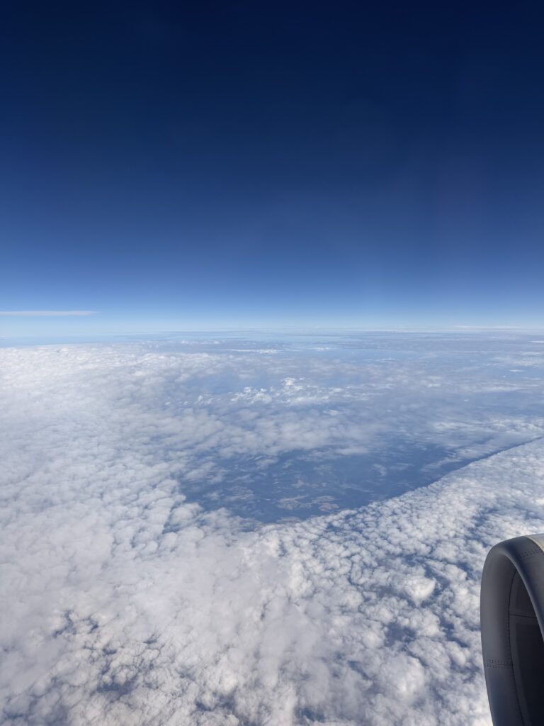 Clouds in the sky taken from airplane window; getting near French countryside on the way to Nantes, France. 