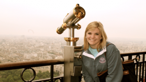 Visiting the Eiffel Tower while studying in Paris. 