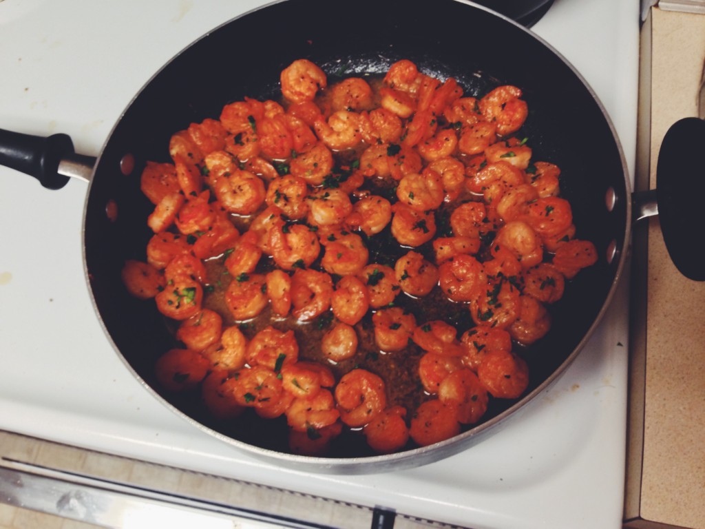 Cooking the shrimp in a skillet over medium heat